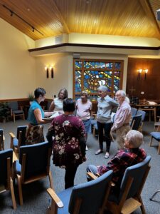 Hillcrest | Myra hosting a music therapy session