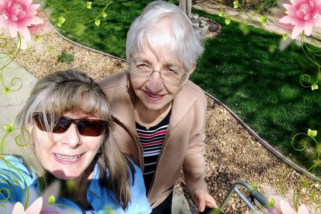 Hillcrest | Two senior residents smiling outside