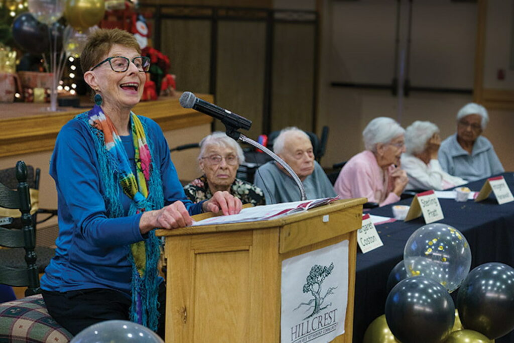 Hillcrest | Centenarian giving a talk during an event recognized